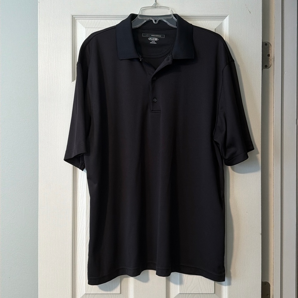 Greg Norman black golf shirt